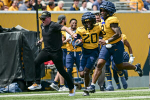 Pat McAfee's gold team tops Pat White's blue team in WVU's annual spring game